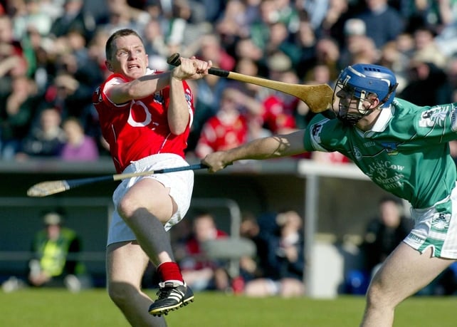 Cork withstood a late Limerick onslaught at Semple Stadium to advance to the semi-finals of the All-Ireland Championship