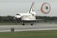 Discovery shuttle lands after 13-day mission Discovery shuttle lands after 13-day mission