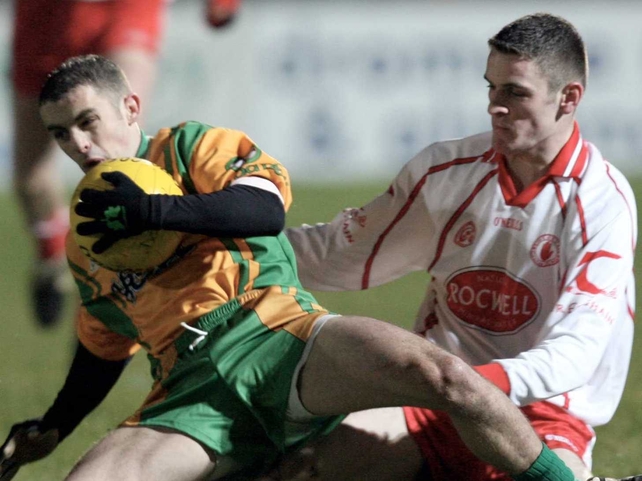 Damien McCaul (right) makes a challenge in last week's final
