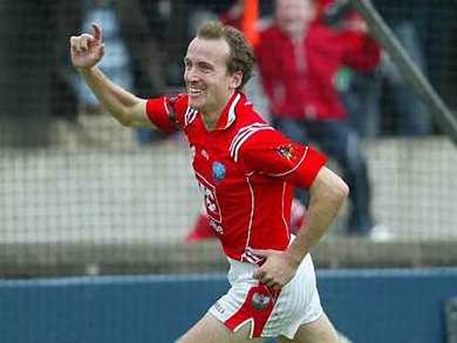 Nicky McDonnell wheels away after his late goal for Louth