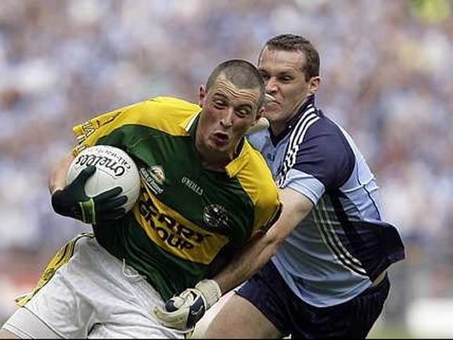 Kieran Donaghy evades a challenge from Ciaran Whelan