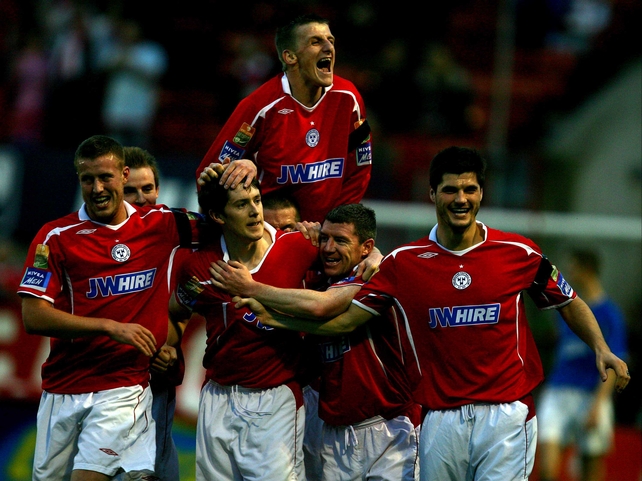 Shelbourne players celebrate Aidan Collins' goal