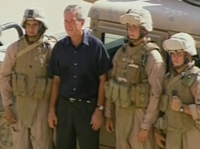 George W Bush - With troops on his recent visit to Iraq George W Bush - With troops on his recent visit to Iraq