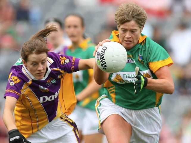 Maeve Quinn of Leitrim holds onto possession despite the efforts of Wexford's Kate Kelly