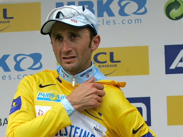 Davide Rebellin don's the leader's yellow jersey