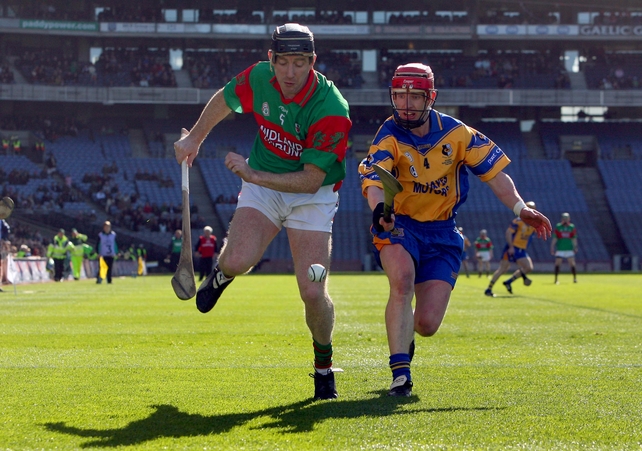 Brian Whelehan of Birr with Ollie Canning of Portumna