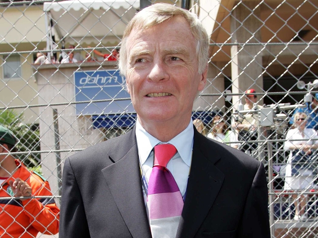 FIA president Max Mosley has revealed that Ferrari are taking court action to block proposed F1 rule changes