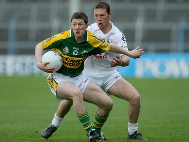 Kieran O'Leary of Kerry holds off Kildare's Tom Byrne Kildare in Thurles tonight