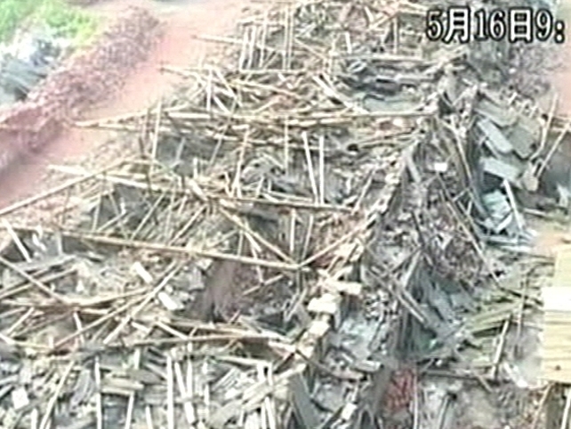 China - Flattened cities and towns need clearing after quake China - Flattened cities and towns need clearing after quake