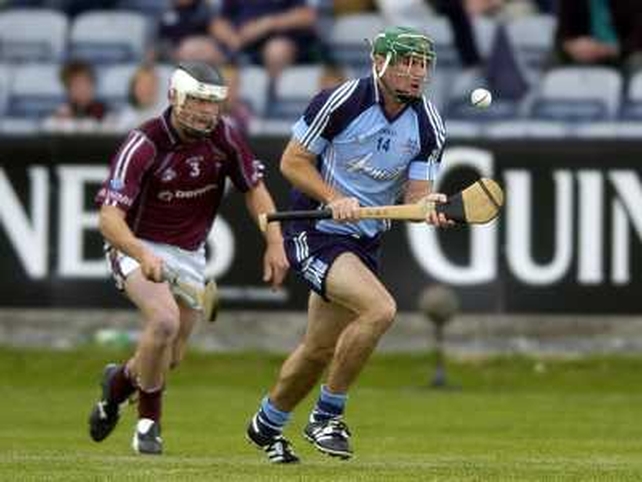 Dublin's double goalscorer John Kelly is closed down by Westmeath's Paul Greville