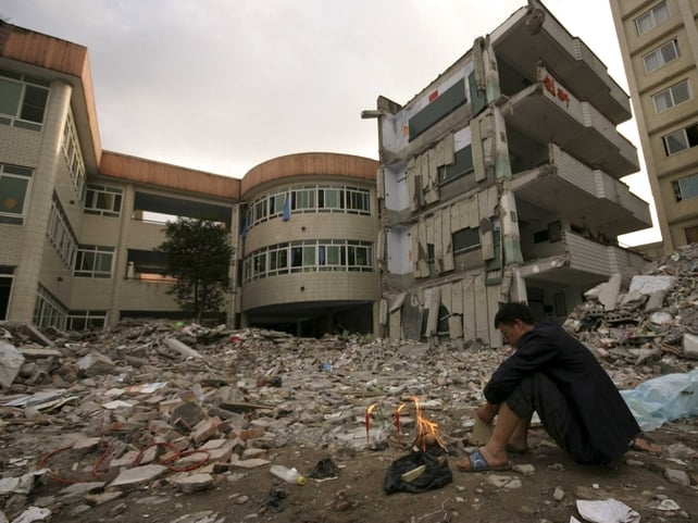 China - Money funnelled to quake victims China - Money funnelled to quake victims