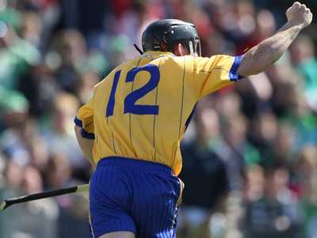 Clare's Jonathan Clancy celebrates after hitting the back of the Limerick net