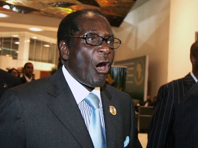 Robert Mugabe - Re-elected as party leader Robert Mugabe - Re-elected as party leader