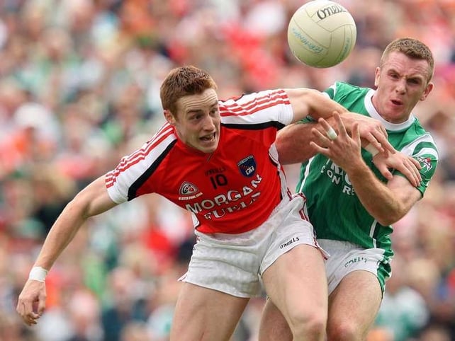 Armagh's Charlie Vernon and Fermanagh's Martin McGrath tussle during an absorbing Ulster SFC final in Clones