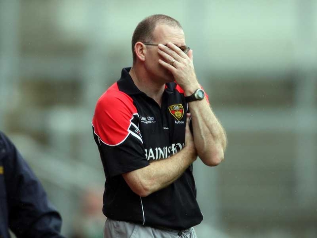 Ross Carr's Down side were dumped out of the McKenna Cup by Queen's