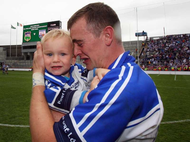 Marksman-in-chief Eoin Kelly embraces son Sean at the final whistle after guiding the Deise to a first SHC final since 1963