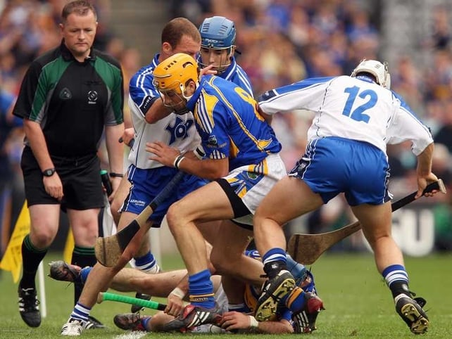 Tipperary's James Woodlock & Conor O'Brien and Waterford's Eoin McGrath & Stephen Molumphy battle for possession