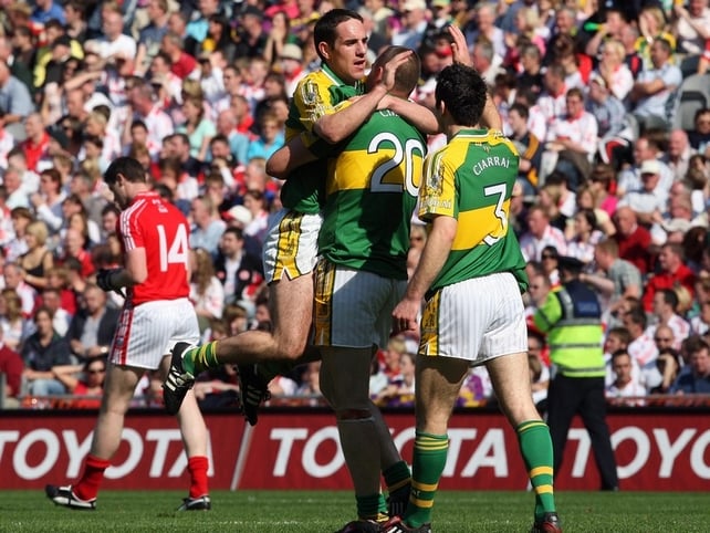 Declan O'Sullivan, Michael Quirke and Tom O'Sullivan celebrate at the final whistle