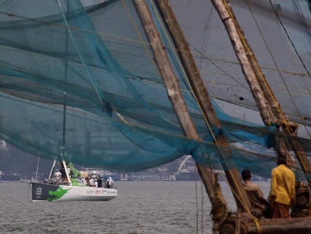 The Green Dragon leaves Cochin under the watchful eye of local fishermen