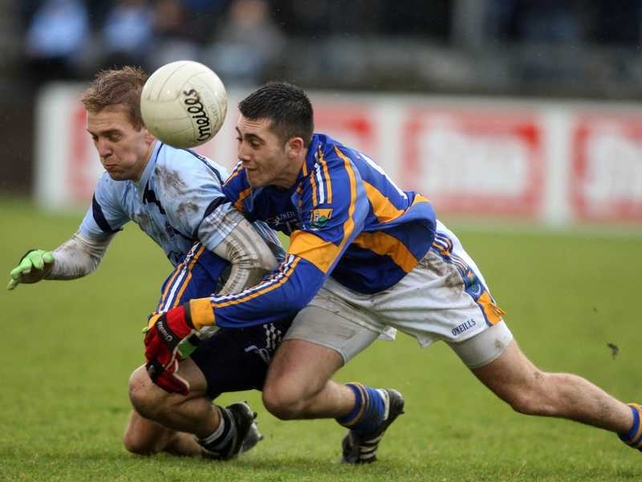 John Cooper of Dublin and Wicklow's Darren Hayden battle for possession