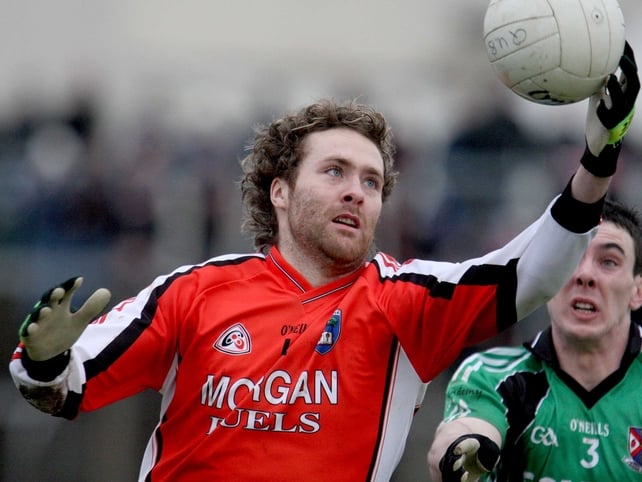 Ryan Henderson's goals proved crucial as Armagh defeated Queen's