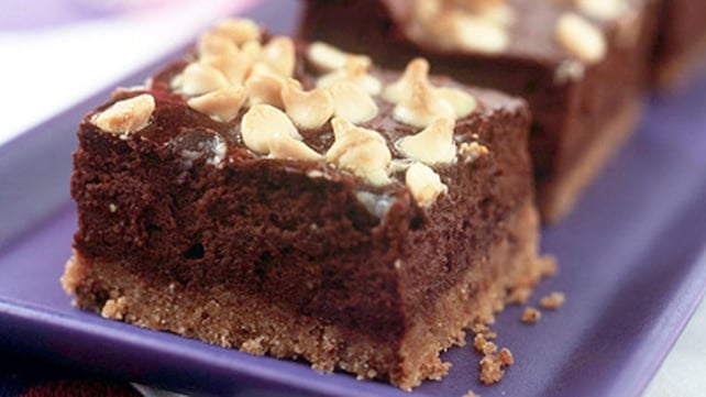Sticky Fudge Cheesecake served with a Blackberry Sorbet Sticky Fudge Cheesecake served with a Blackberry Sorbet