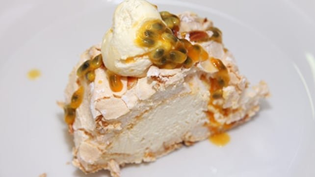 Passion Fruit and Lemon Meringue Roulade Served with Passion Fruit Sauce Passion Fruit and Lemon Meringue Roulade Served with Passion Fruit Sauce