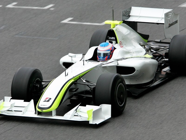 Jenson Button will take the F1 title with ease according to Mark Webber