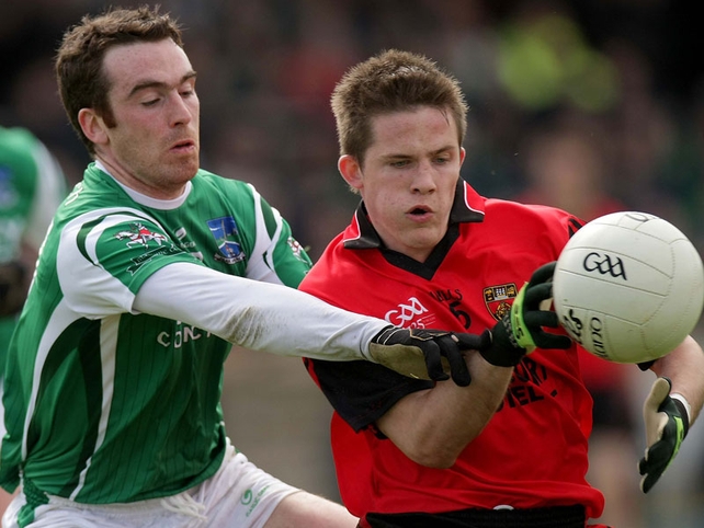 Fermanagh's Niall Bogue and Down's Paul McComiskey battle for possesion at Brewster Park