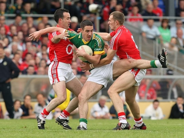 Cork's Kieran O'Connor and Alan O'Connor put Kerry's Declan O'Sullivan under serious pressure