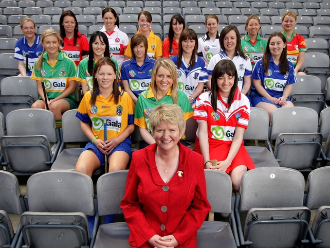 President Joan O'Flynn is pictured with some of the players who will be particpating in the various championships