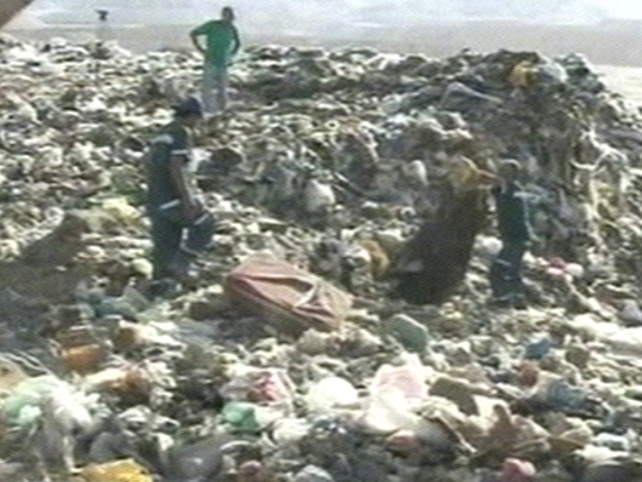 Israel - Search for valuable mattress in rubbish dump Israel - Search for valuable mattress in rubbish dump