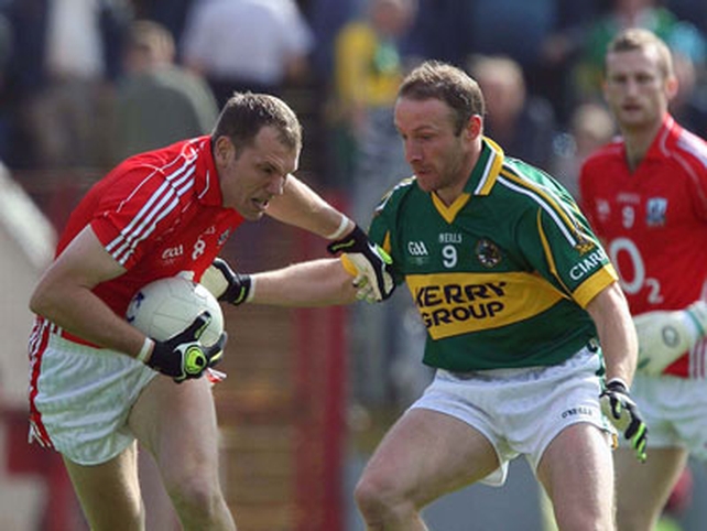 Cork's Alan O'Connor is confronted by Tommy Griffin of Kerry in the Munster SFC semi-final replay