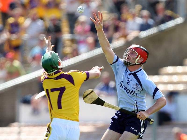 Dublin's Niall Corcoran gets there ahead of Harry Kehoe