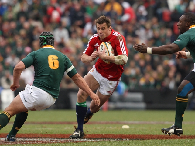 Tommy Bowe weaves his way around the South African cover
