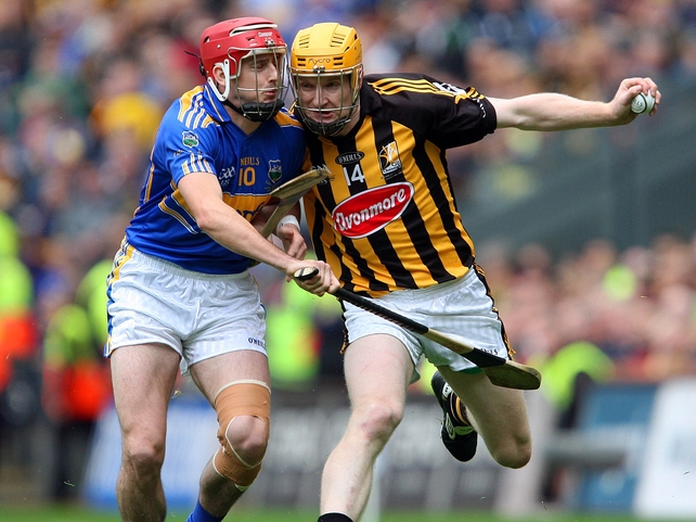 Kilkenny's Richie Power and Tipperary's Pat Kerwick giving it all in this superb hurling final