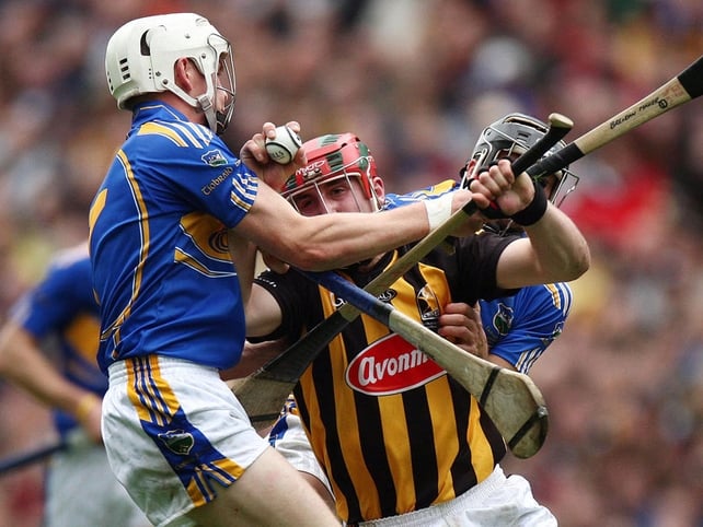 Tipperay's Brendan Maher tries to get to grips with Kilkenny's Eoin Larkin