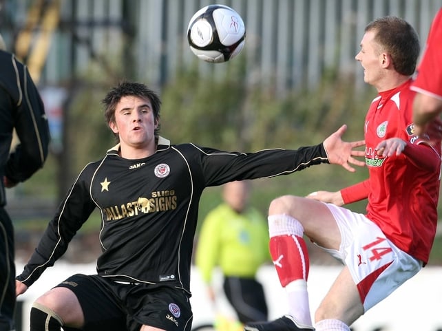 Sligo Rovers' Danny Keohane and Cliftonville's Ciaran Caldwell have their eye on the ball at Solitude
