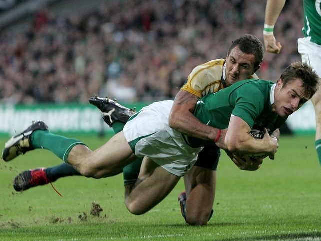 Quade Cooper can't prevent Tommy Bowe scoring a try during the recent draw at Croke Park