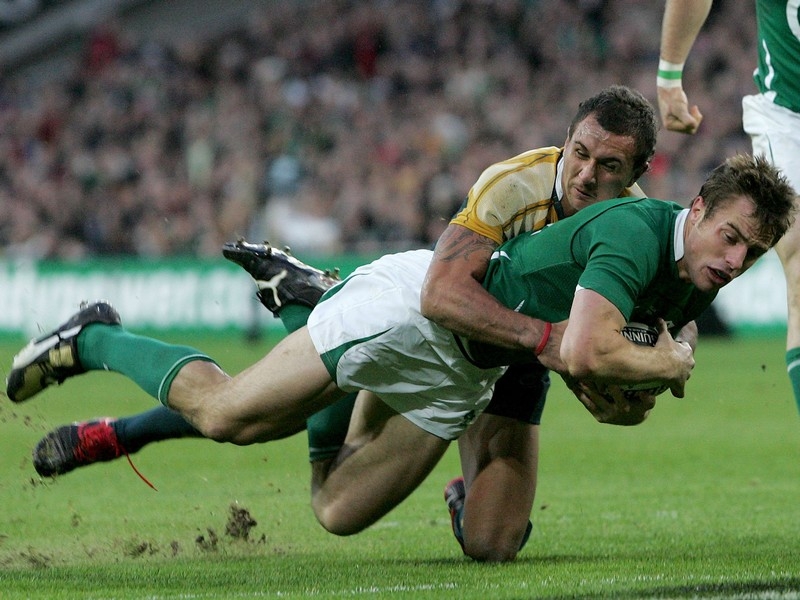 Quade Cooper can't prevent Tommy Bowe scoring a try during the recent draw at Croke Park