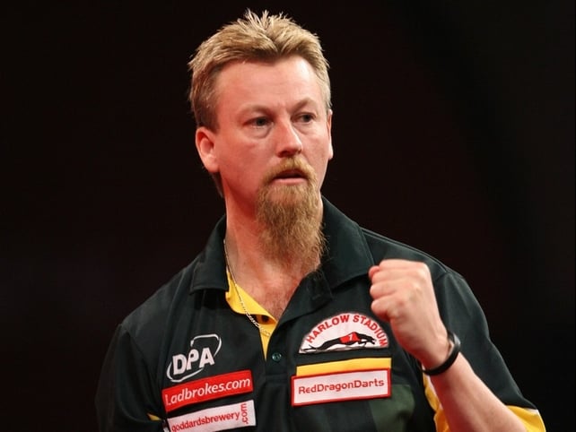Aussie Simon Whitlock knocked out the much-fancied James Wade