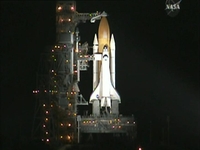 Shuttle launches on mission to space station Shuttle launches on mission to space station