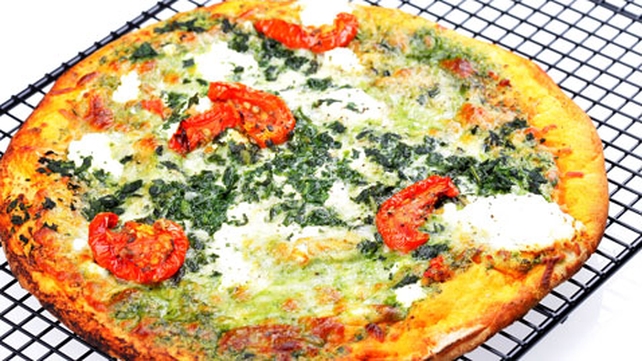 Pizza Bianco with grilled chicken, scallions and fontina cheese with roast tomato dressing Pizza Bianco with grilled chicken, scallions and fontina cheese with roast tomato dressing