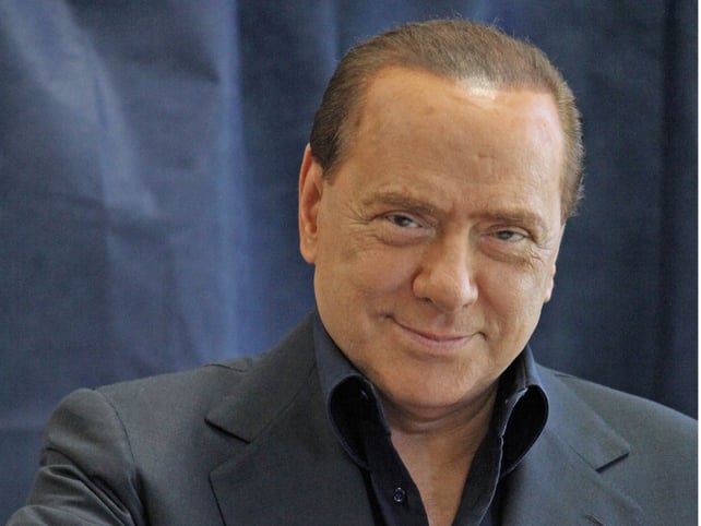 Silvio Berlusconi - New law gives him temporary immunity Silvio Berlusconi - New law gives him temporary immunity