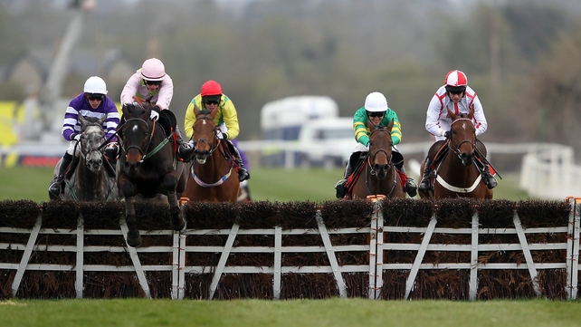 Blackstairmountain and Paul Townend - second from left jumps the last in froni