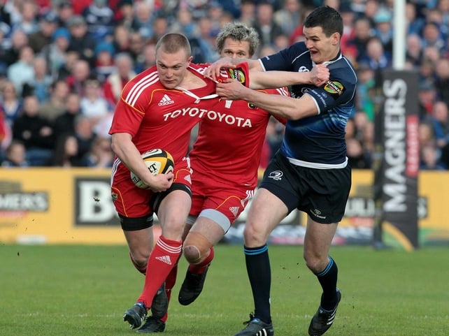 Keith Earls and Jonathan Sexton in action at the RDS