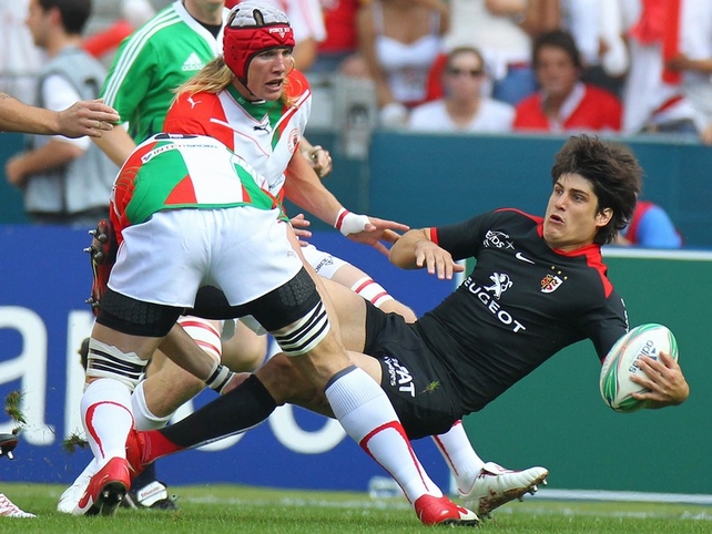 David Skrela is hammered by Magnus Lund at the Stade de France