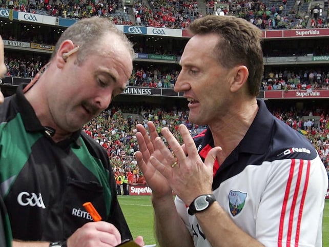 Louth manager Peter Fitzpatrick pleads with referee Martin Sludden