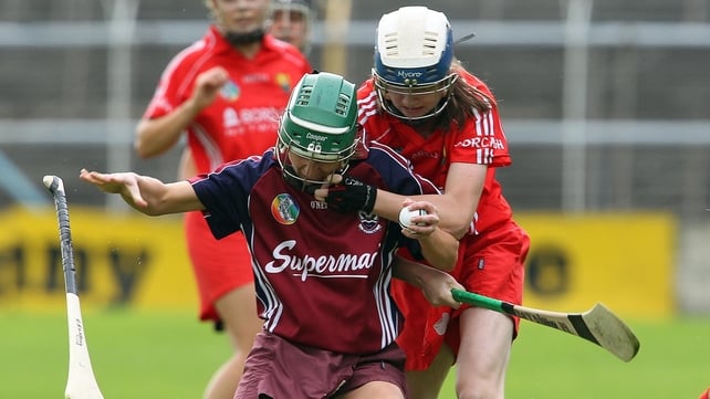 Galway's Orla Kilkenny is flattened by Katriona Mackey of Cork