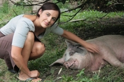 Ear to the Ground - Ella McSweeney and one of her pigs before the slaughter